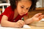 Photo of little girl drawing