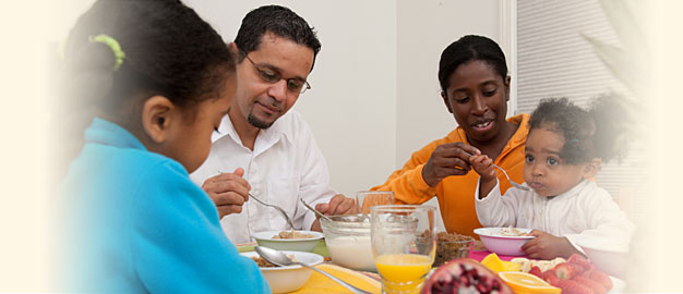 photo of family sharing a meal